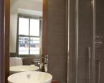 Immagine #13 delle camere di Maitrise Suites Apartment